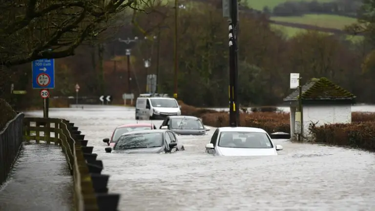 cars sit submerged flood water 788019355.jpg