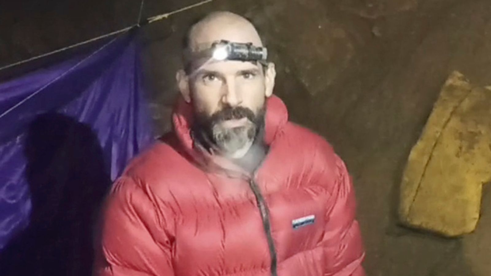 Mark Dickey: Caver trapped 1,000m underground ‘up and alert’ in video message | World News