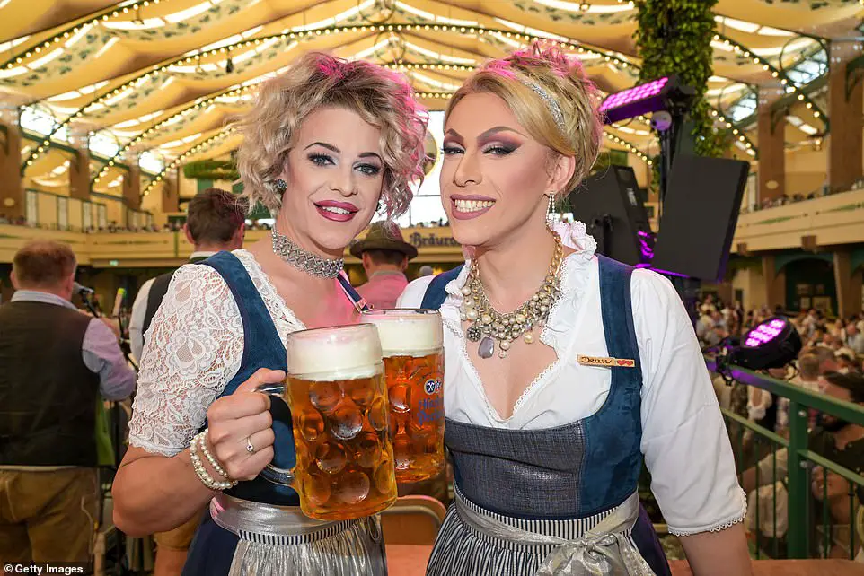 Stein of the times! Millions descend on Munich to consume as much beer and bratwurst as possible during the 213th annual Oktoberfest