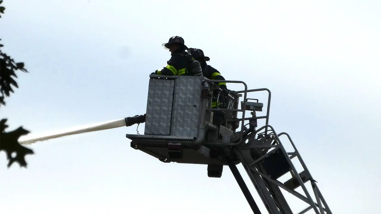 Massachusetts’ junkyard blaze leaves one hospitalized in two-alarm fire