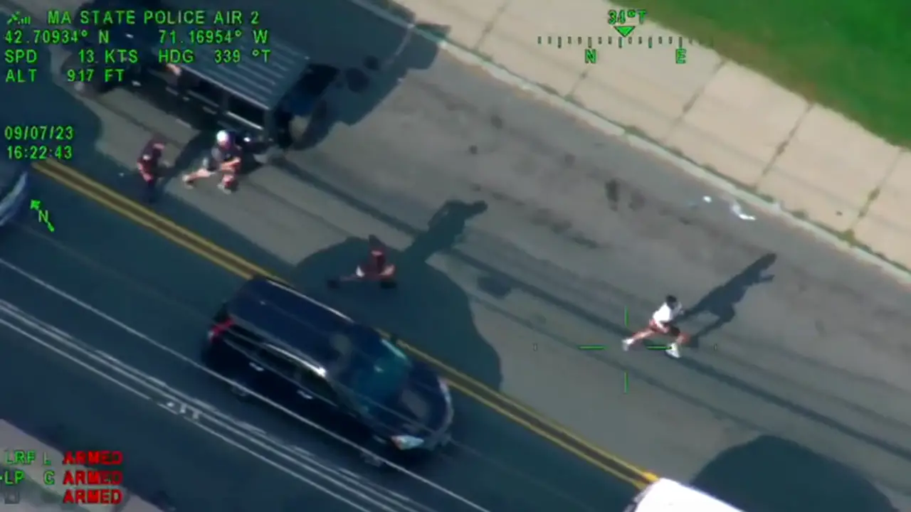 Massachusetts State Police video shows officers chasing down dirt bike riders in city streets