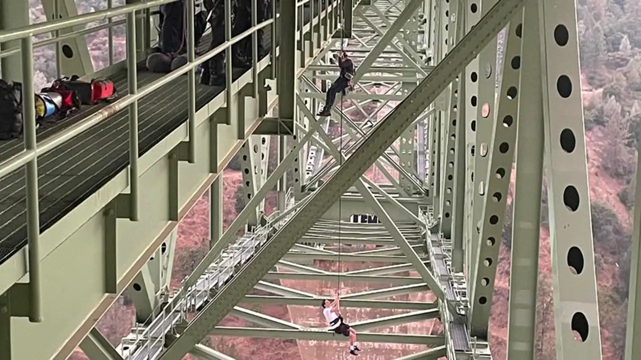 California sheriff releases image showing rescue of teen dangling 700 feet up on state’s highest bridge
