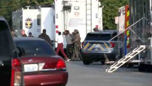 Louisville police officer critically wounded during traffic stop after shots fired from nearby home