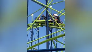 Operators at Washington State Fair forced to manually push roller coaster after it breaks down in midair