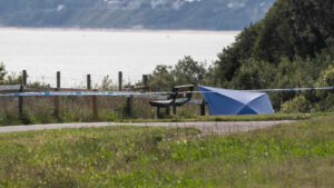 Woman, 38, and man, 48, charged with murder after human remains found at popular seaside path in Bournemouth
