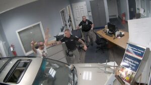 NJ man accused of deliberately crashing car into home, police station