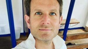 Doctor ‘showed 197 photos & videos of himself having sex with other women to a colleague he was romping’