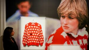 Princess Diana’s iconic black sheep jumper fetches nearly £1m at auction | UK News