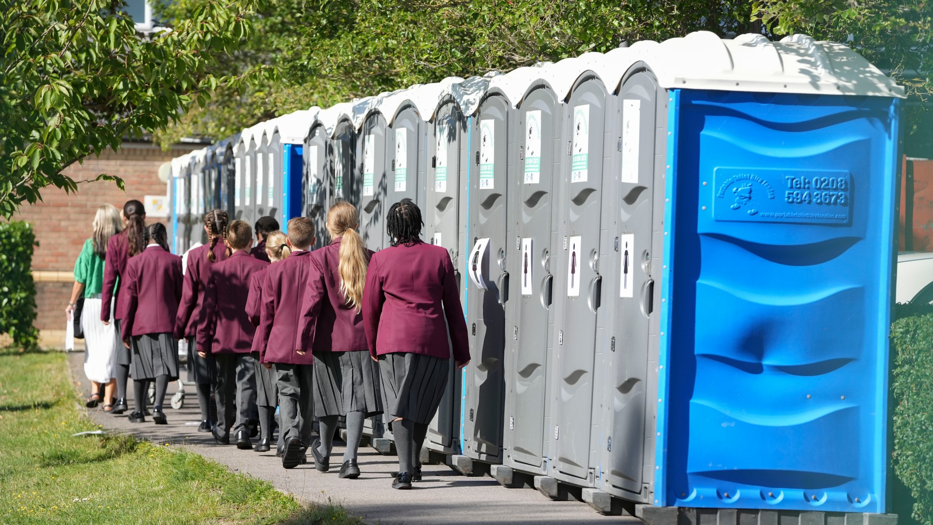 Frantic teachers begging parents to help them find PORTALOOS so they can fully open schools in concrete crisis