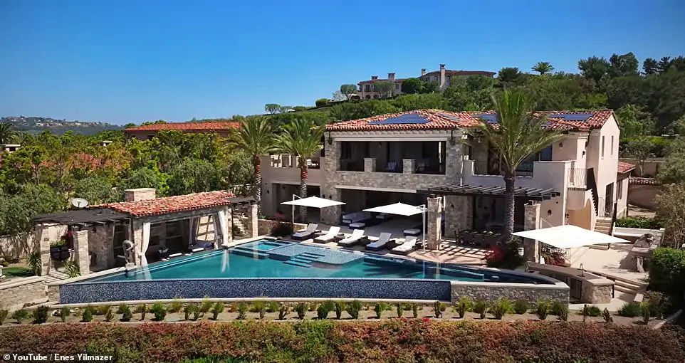 Inside awe-inspiring $59 MILLION Mediterranean villa located in America’s most EXPENSIVE neighborhood – which comes complete with a movie theater, car gallery, putting green and stunning WINE ROOM