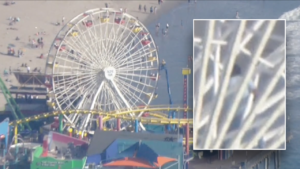 Man climbs California Ferris wheel claiming to have bomb, forcing evacuation of Santa Monica Pier