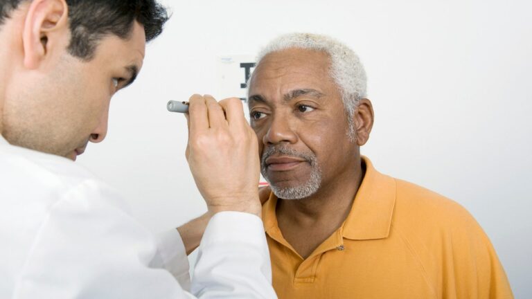 senior man eye exam.jpg